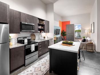 Espresso cabinetry with under cabinet lighting